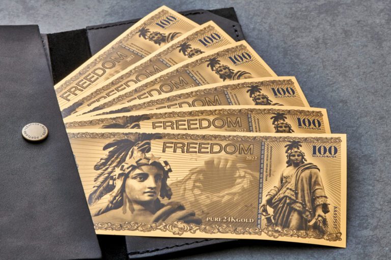 Aurum® Freedom bills in a wallet