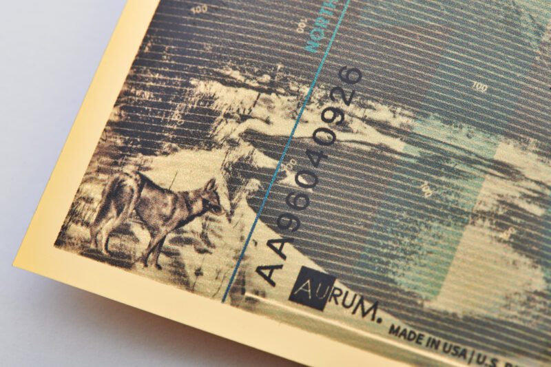 Close up of the unique serial number on the 2023 North American Animal Series Gray Wolf Aurum bill.
