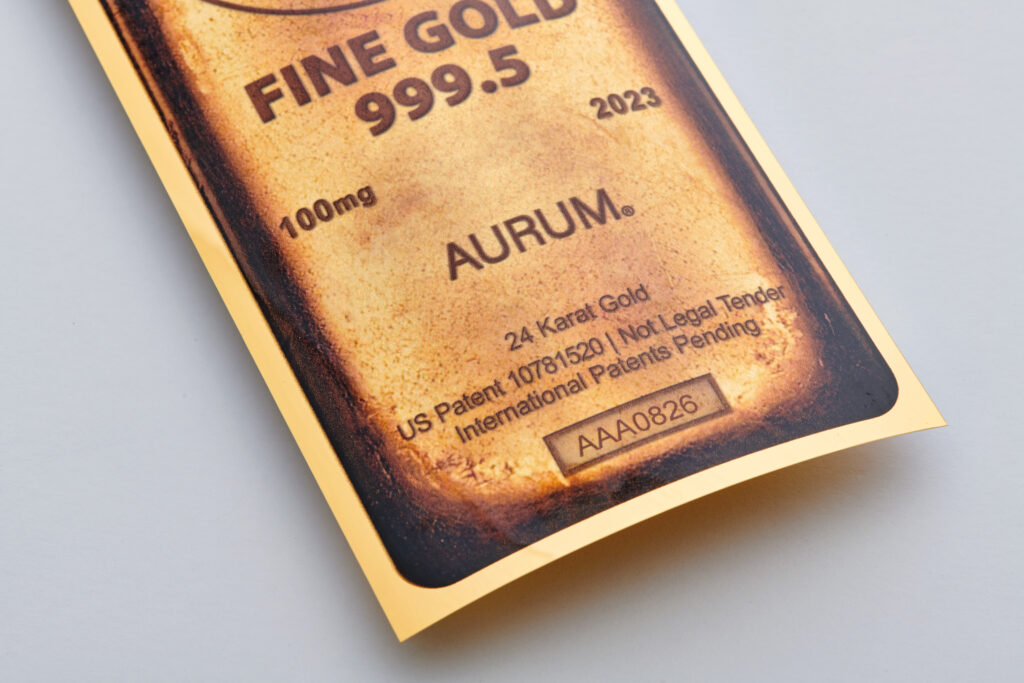 The unique serial number on a 2023 Gold Bar Aurum bill.