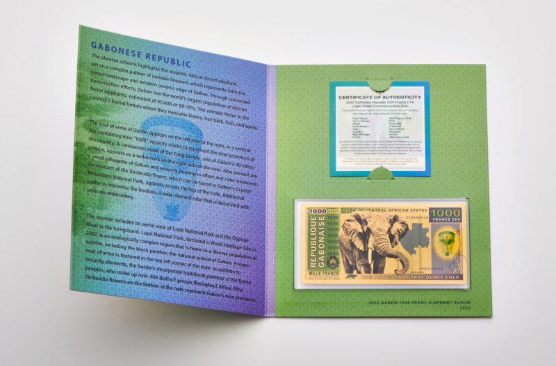 The packaging insert, open for the 1000 Franc Gabon Aurum® Gold Bill.
