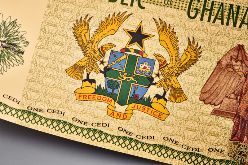 1 Cedi Justice Gold Aurum® close up of seal on the back of the bill.